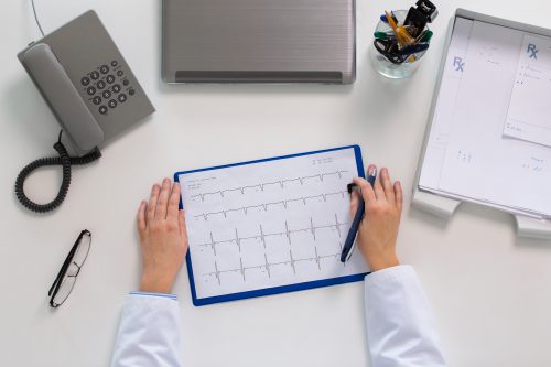 healthcare provider plotting schedule for medical virtual assistant