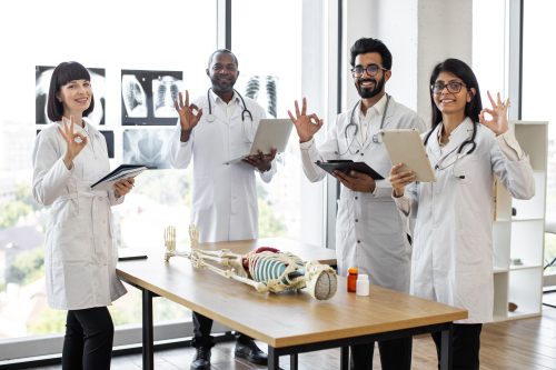 happy doctors working with remote medical collections specialists